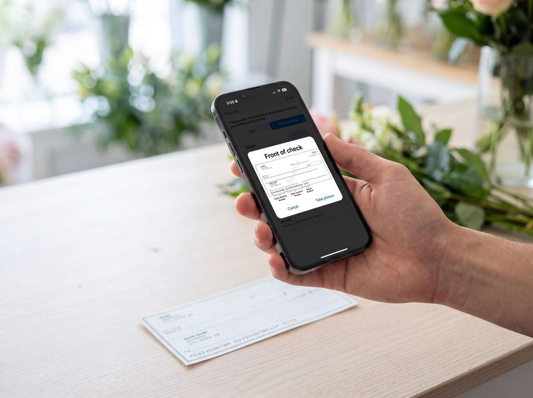 Capturing the front of a paper cheque in the SurePay app.